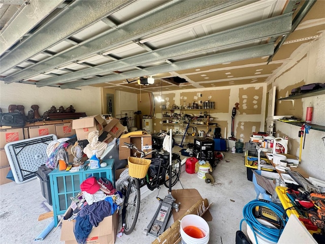 garage featuring a garage door opener and a workshop area