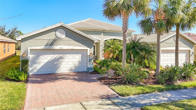 view of front of property with a garage