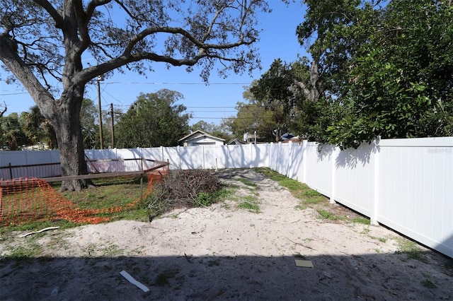 view of yard featuring a fenced backyard