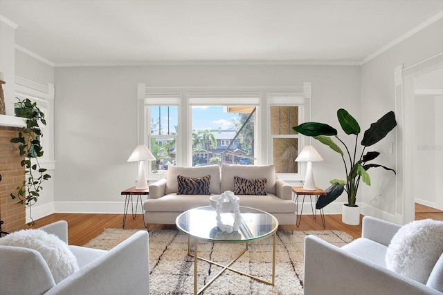 living room with hardwood / wood-style flooring and crown molding