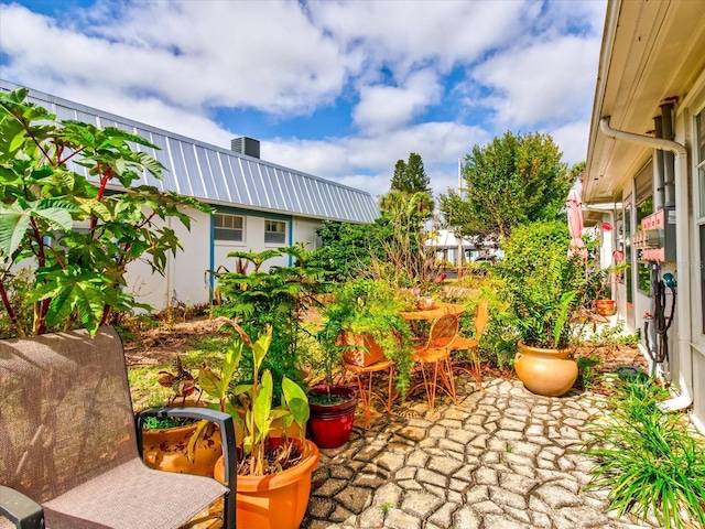 exterior space with outdoor dining area