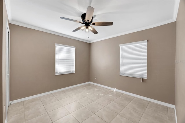 empty room featuring crown molding and ceiling fan