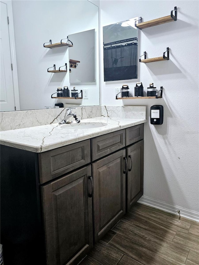 bathroom with vanity and curtained shower