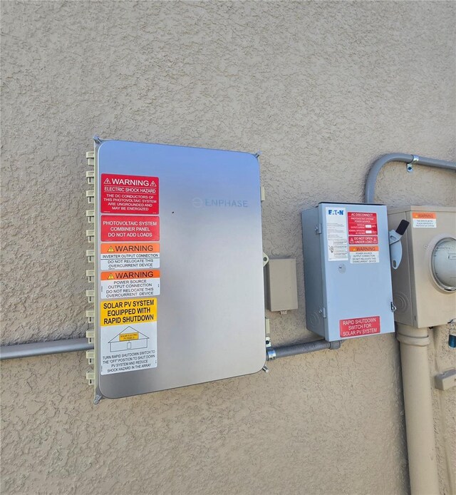 4035 Solamor St, Lakeland, FL 33810 - exterior details with electric meter and stucco siding