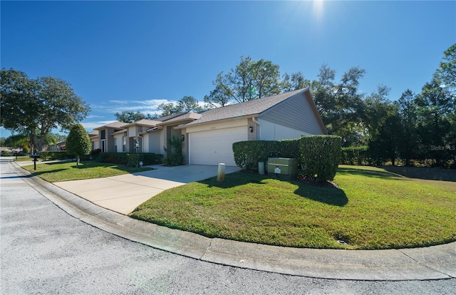 view of front of property with driveway, an attached garage, a front lawn, and brick siding