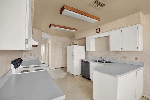 kitchen featuring range with electric stovetop, sink, black dishwasher, white cabinets, and white refrigerator