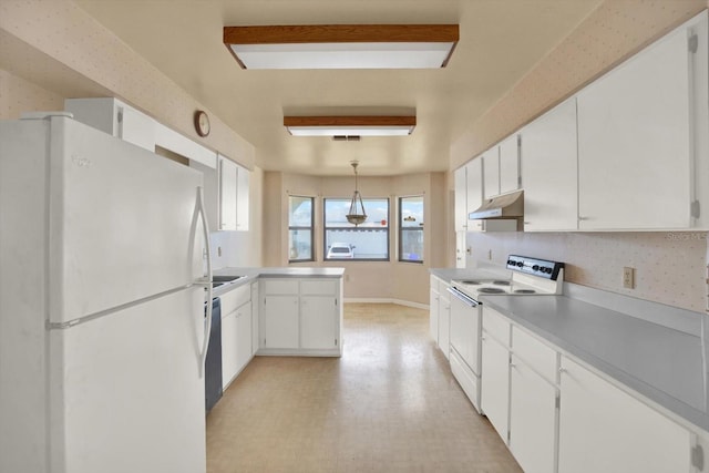 kitchen featuring white cabinetry, kitchen peninsula, white appliances, and decorative light fixtures