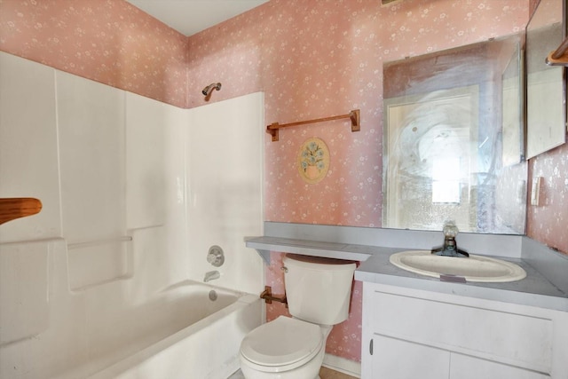 full bathroom with shower / tub combination, vanity, and toilet