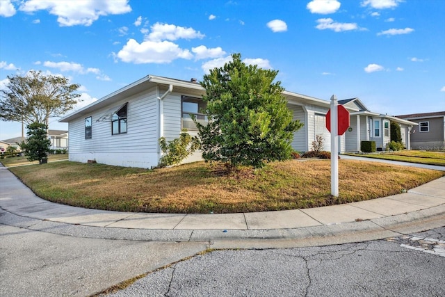 view of front of home with a front yard