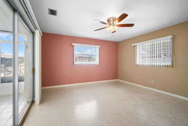 unfurnished room featuring ceiling fan