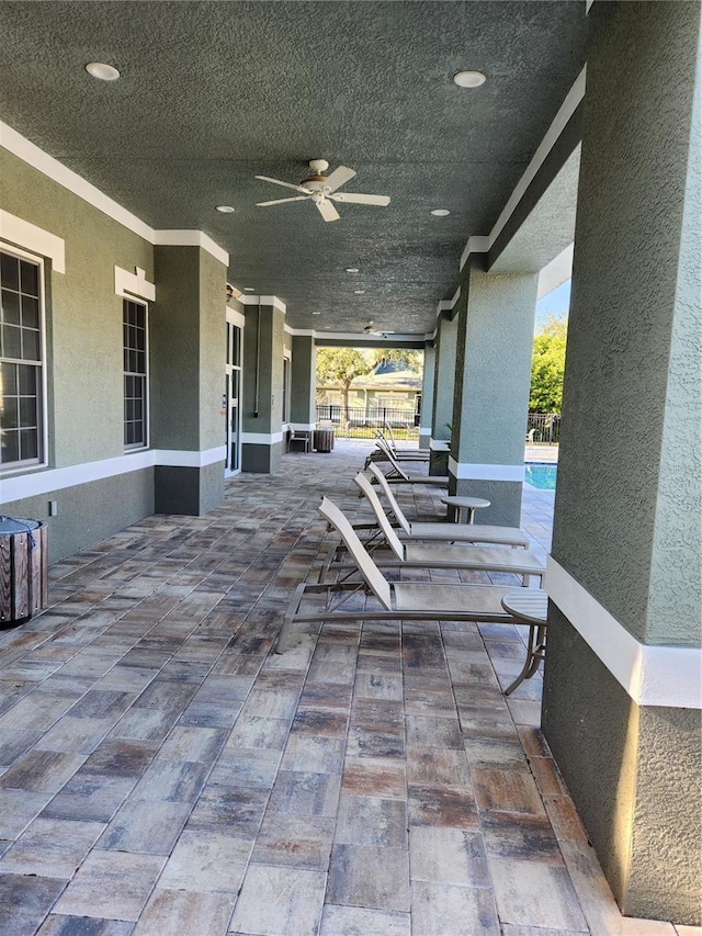 view of patio with ceiling fan