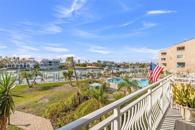 balcony featuring a water view