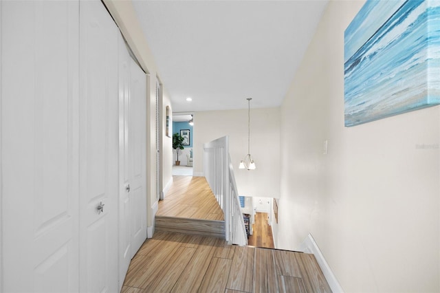 corridor featuring light hardwood / wood-style flooring