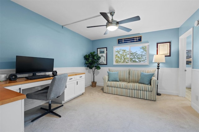 office area with light carpet and ceiling fan