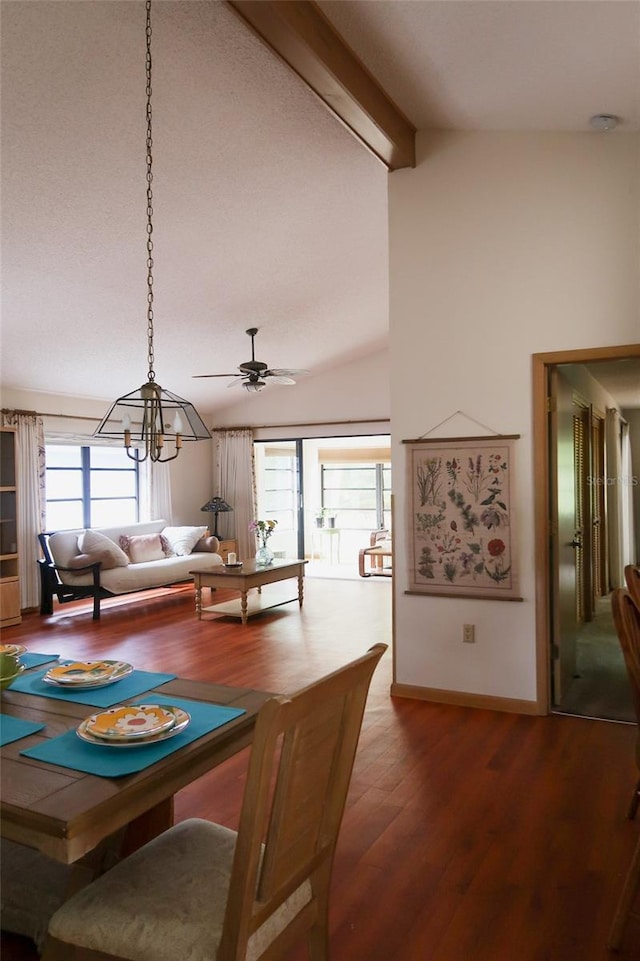 dining room featuring beamed ceiling, ceiling fan, hardwood / wood-style floors, and high vaulted ceiling