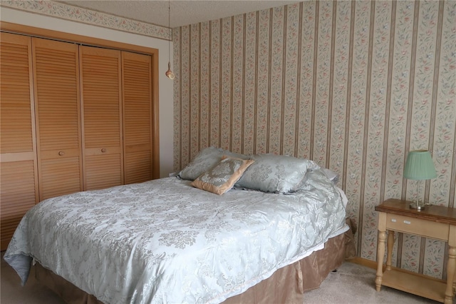 carpeted bedroom with a closet