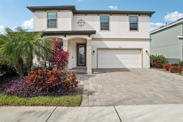 view of front of property with a garage