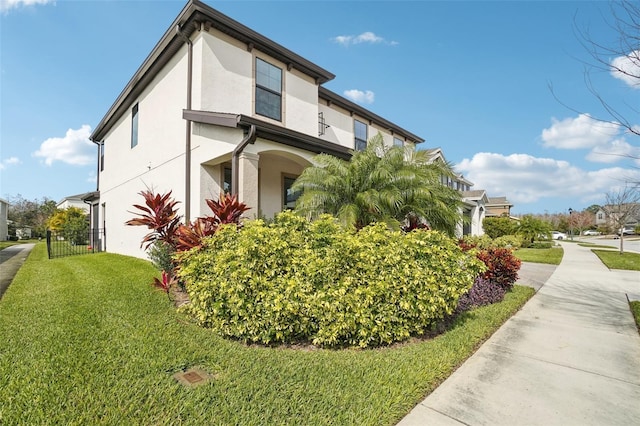 view of home's exterior featuring a yard