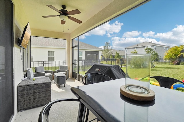 view of patio / terrace featuring ceiling fan, area for grilling, and an outdoor living space