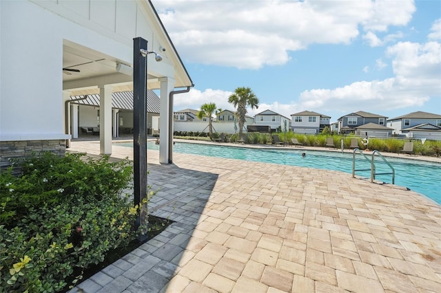 view of pool featuring a pergola and a patio