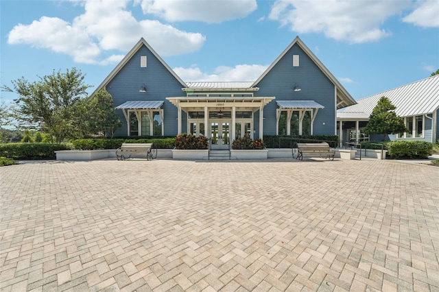 back of property featuring french doors