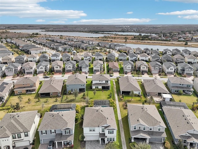 drone / aerial view with a water view