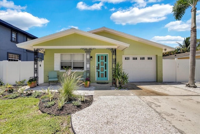 ranch-style house featuring a garage