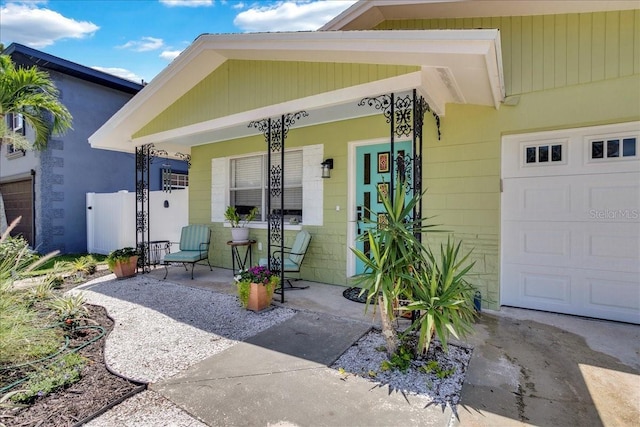 doorway to property featuring covered porch