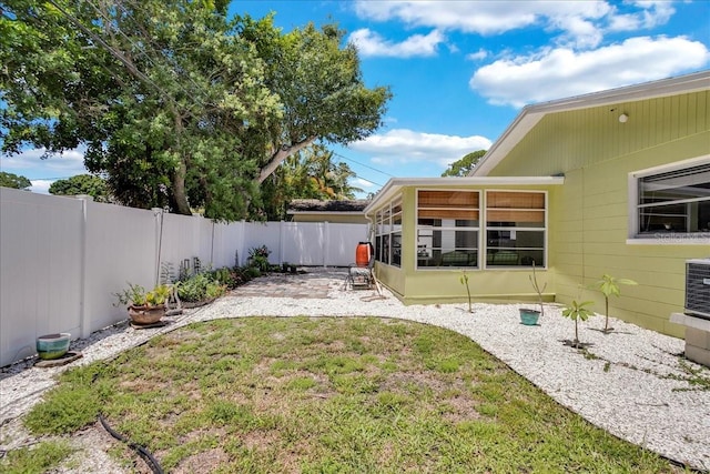 view of yard featuring a fenced backyard and a patio
