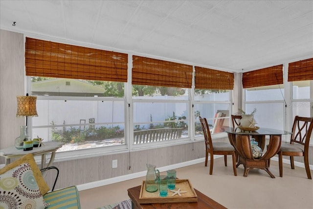 sunroom featuring baseboards