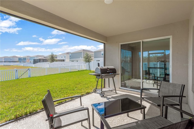 view of patio with a grill