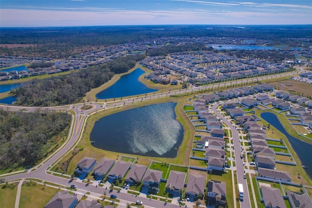 drone / aerial view with a water view