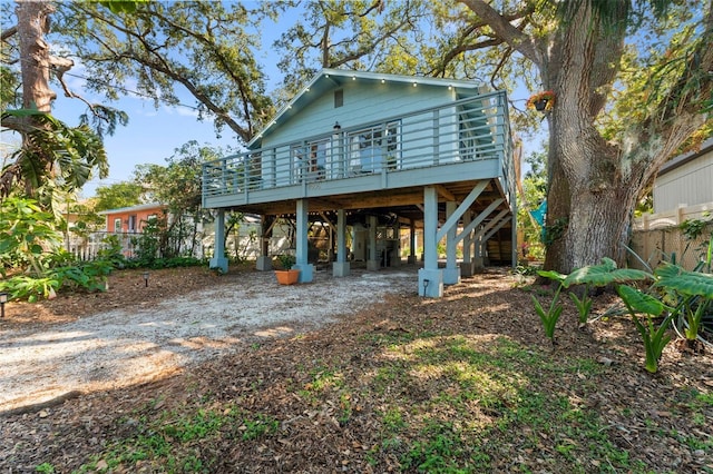 rear view of property with a deck