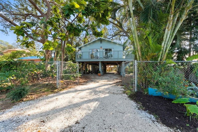 exterior space with a carport