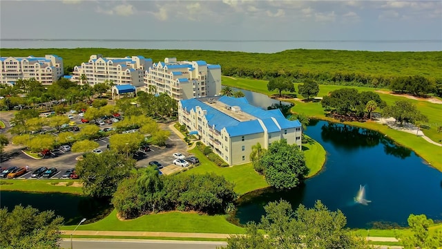 drone / aerial view with a water view