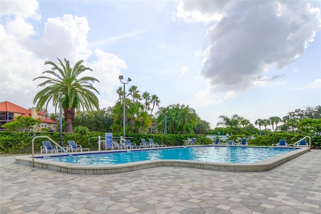 view of swimming pool featuring a patio