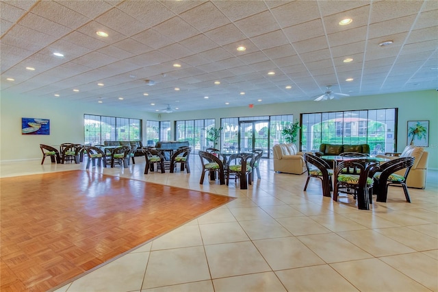 interior space featuring ceiling fan and light parquet flooring