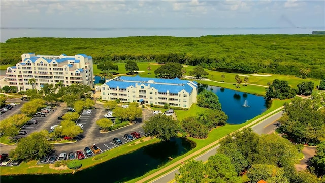 drone / aerial view with a water view