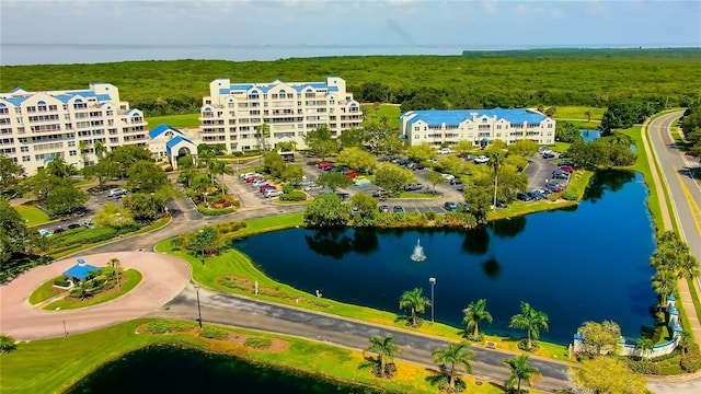 bird's eye view with a water view