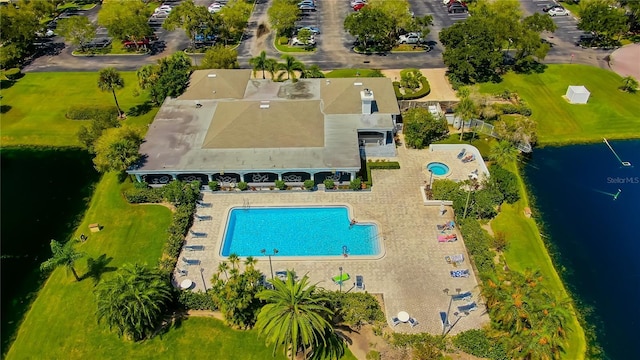 drone / aerial view featuring a water view