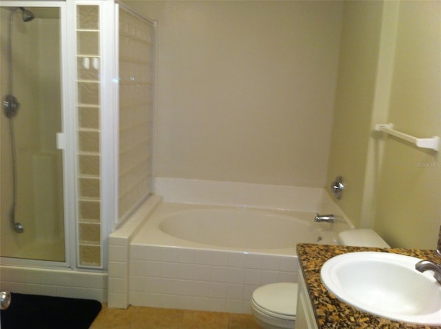 full bathroom featuring vanity, tile patterned floors, plus walk in shower, and toilet