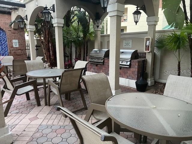 view of patio / terrace featuring exterior kitchen and grilling area