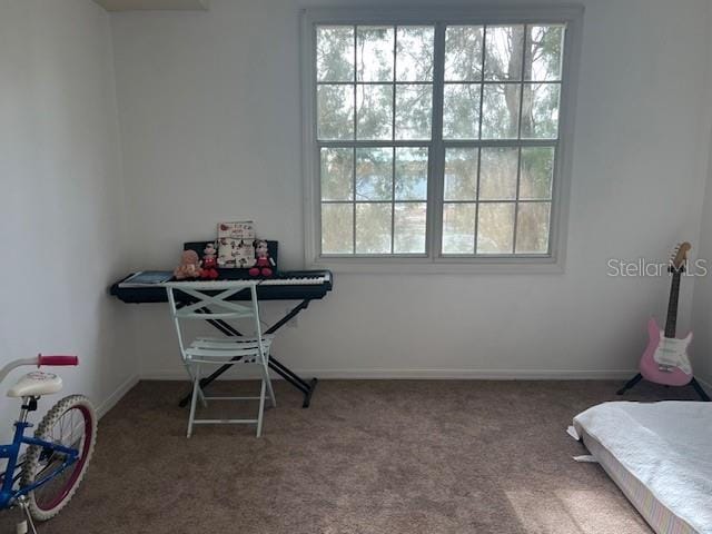 501 Knights Run Ave Unit 2119, Tampa, FL 33602 - carpeted bedroom featuring baseboards