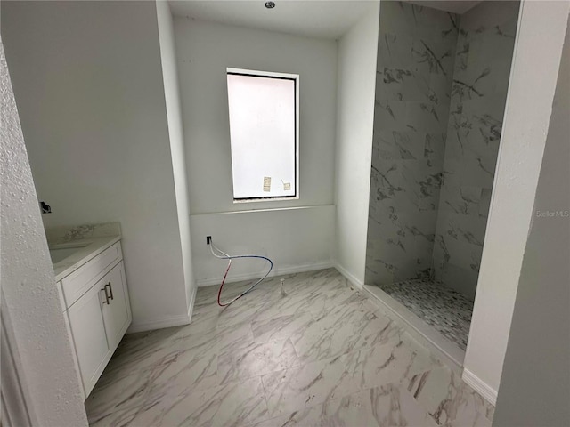 bathroom featuring vanity and walk in shower