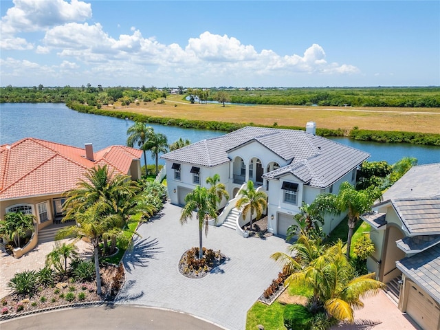 bird's eye view with a water view