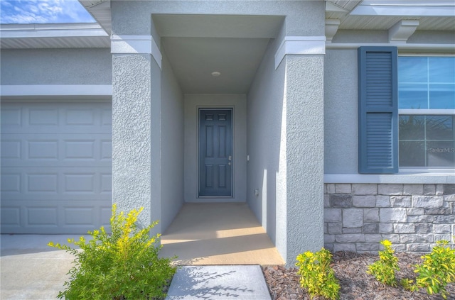 property entrance featuring a garage