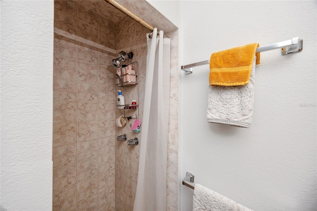 bathroom featuring walk in shower