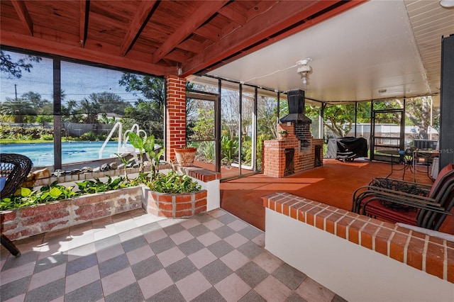 sunroom with wooden ceiling and a hot tub