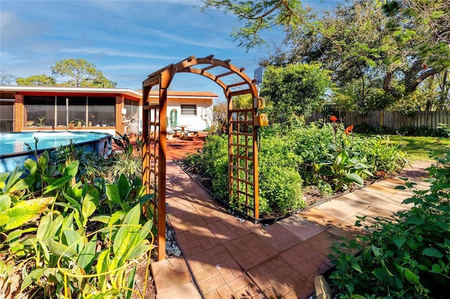 view of patio / terrace featuring fence and a fenced in pool