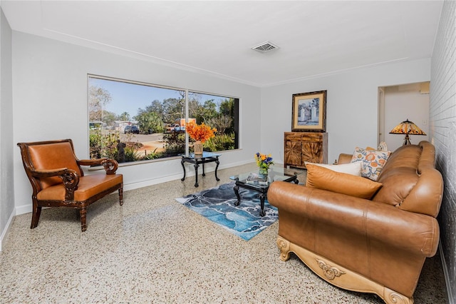 6226 Hampton Ct N, Saint Petersburg, FL 33710 - living area featuring baseboards, visible vents, and speckled floor